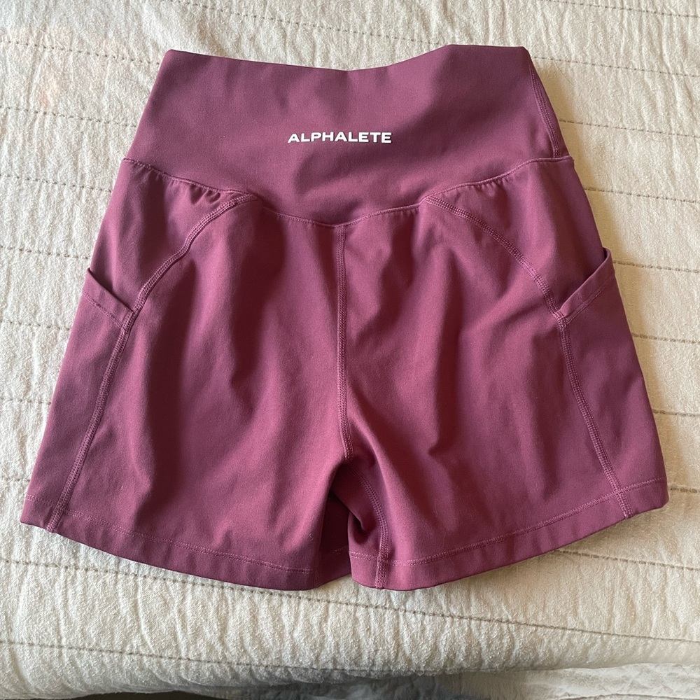 Alphalete surface shorts with pockets